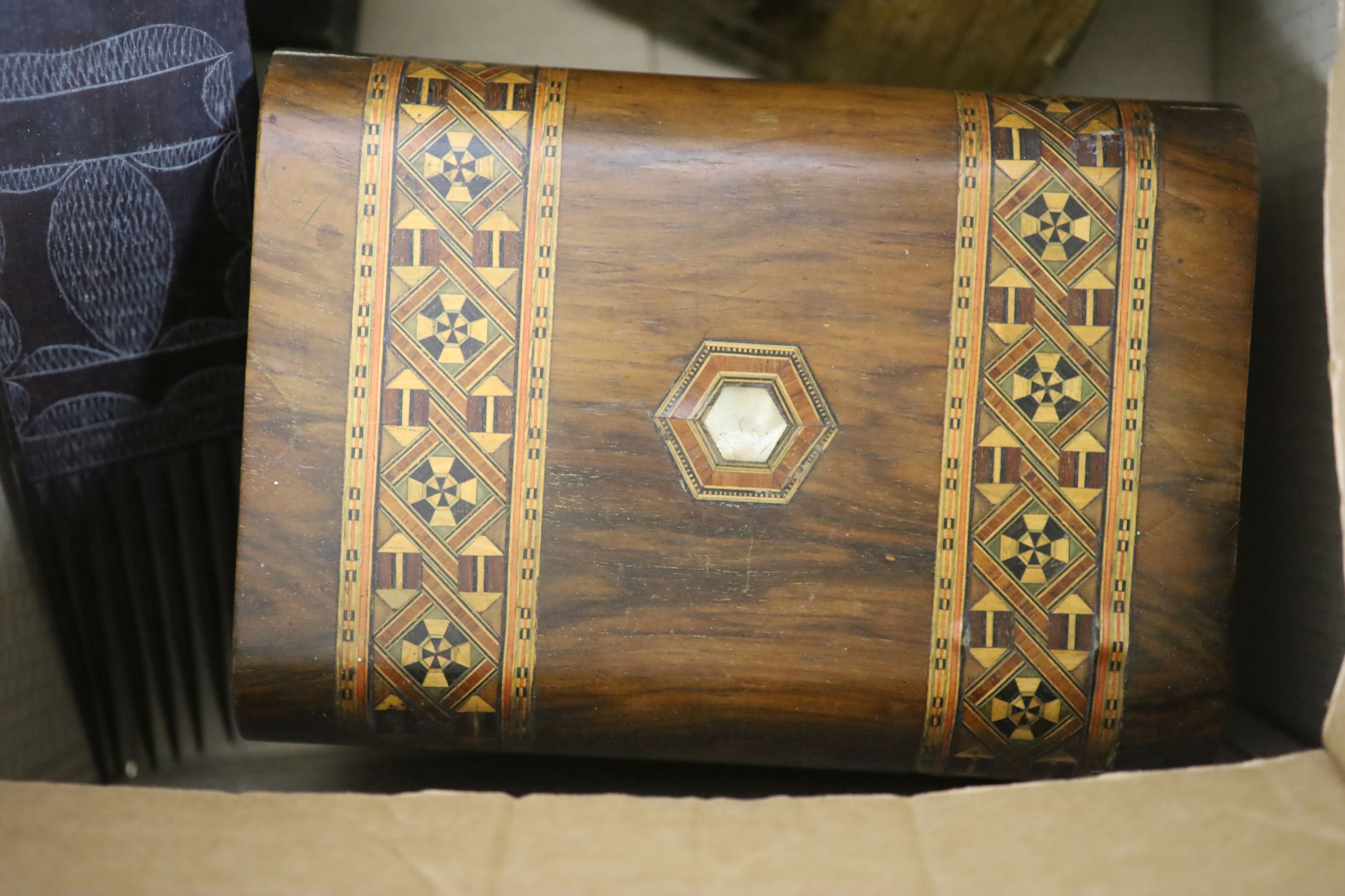 A quantity of mixed collectables including a grain shovel, a Buddha head, an African carved wood comb etc.